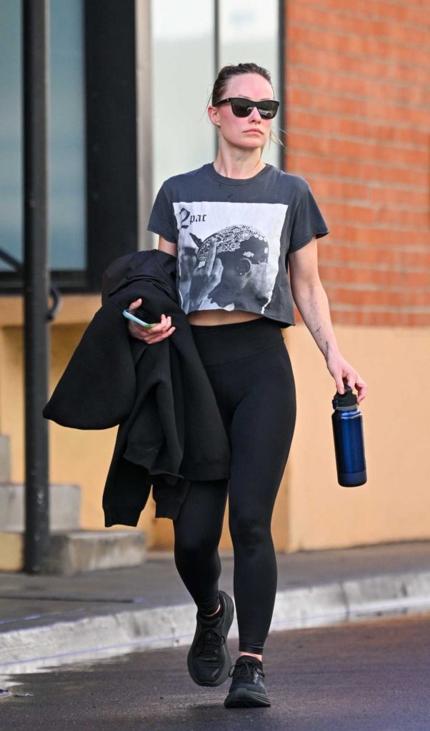 Olivia Wilde in a Black Leggings