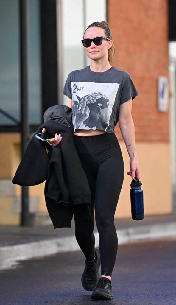 Olivia Wilde in a Black Leggings