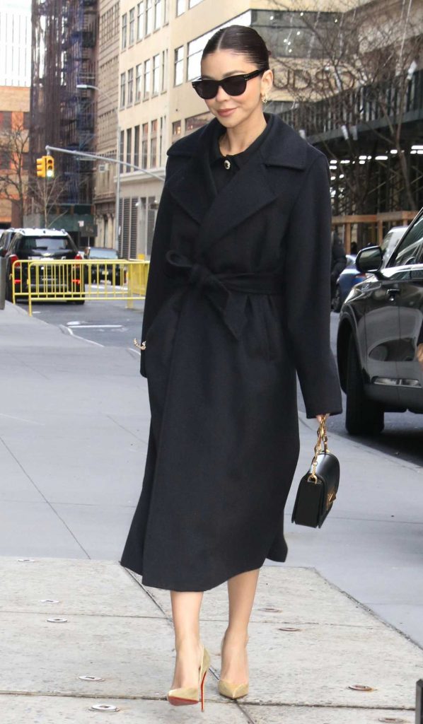 Sarah Hyland in a Black Coat