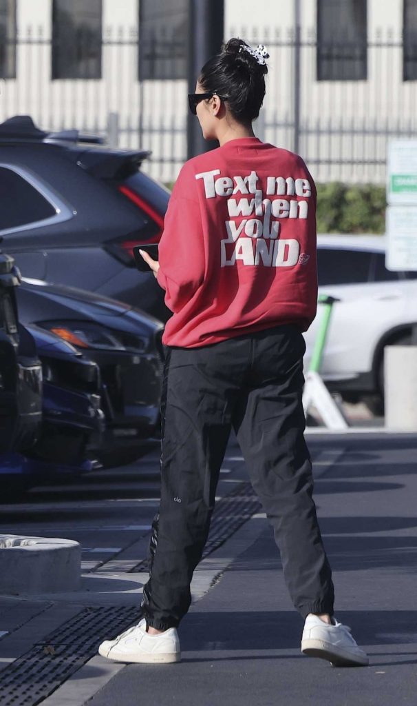 Shay Mitchell in a Red Sweatshirt