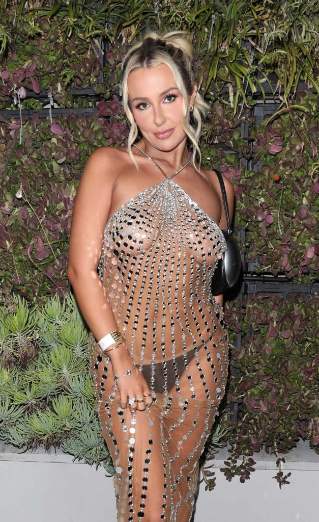 Tana Mongeau in a See-Through Dress