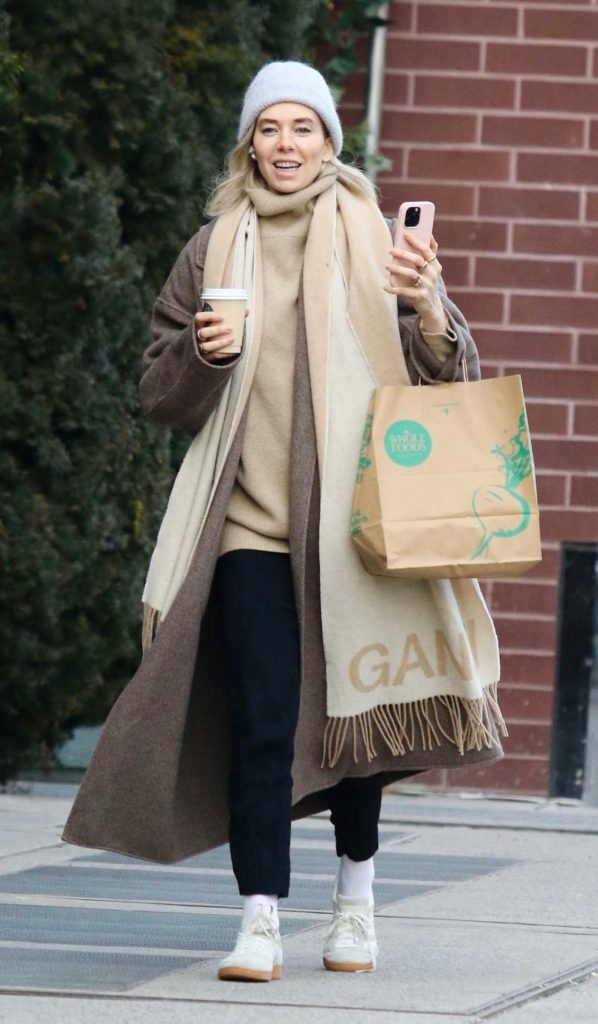 Vanessa Kirby in a Tan Coat