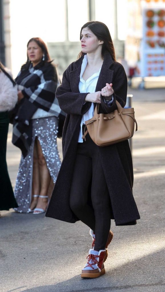 Alexandra Daddario in a Black Coat