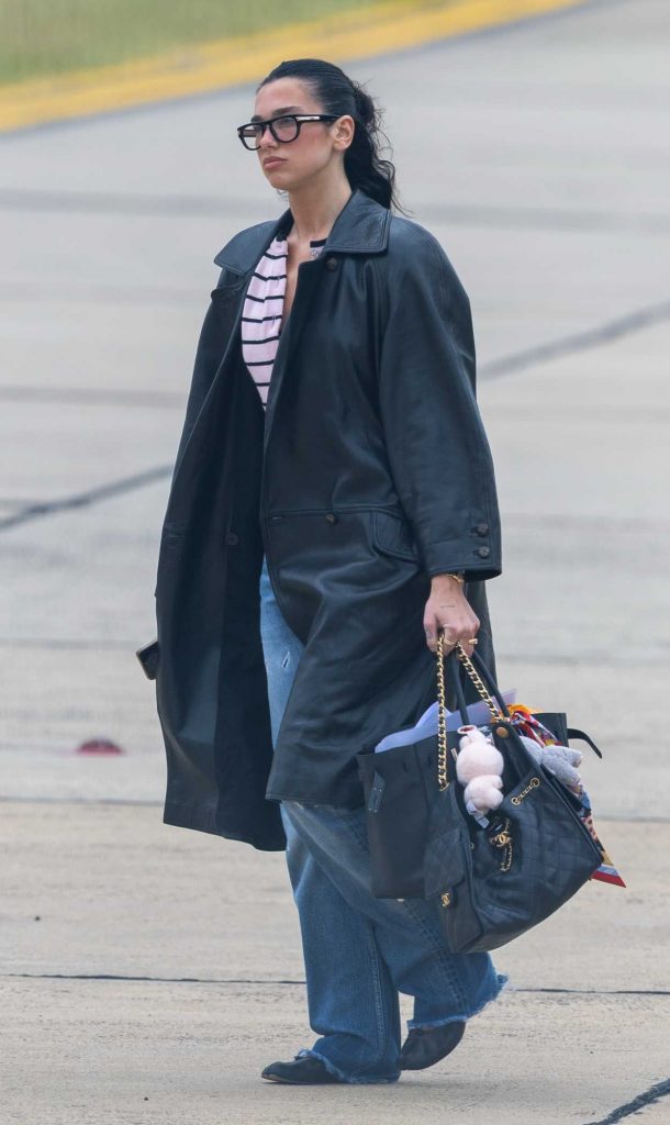 Dua Lipa in a Black Leather Coat