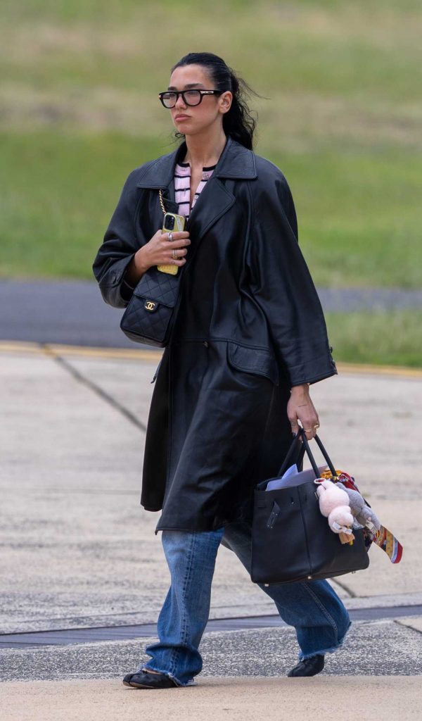 Dua Lipa in a Black Leather Coat