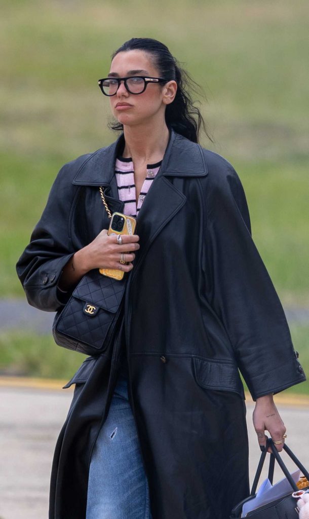 Dua Lipa in a Black Leather Coat