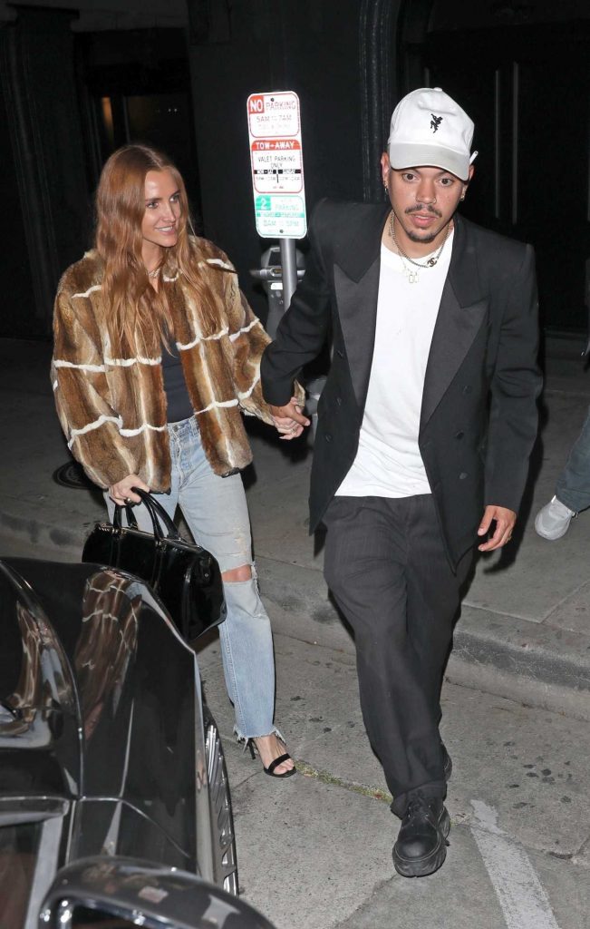 Ashlee Simpson in a Blue Ripped Jeans