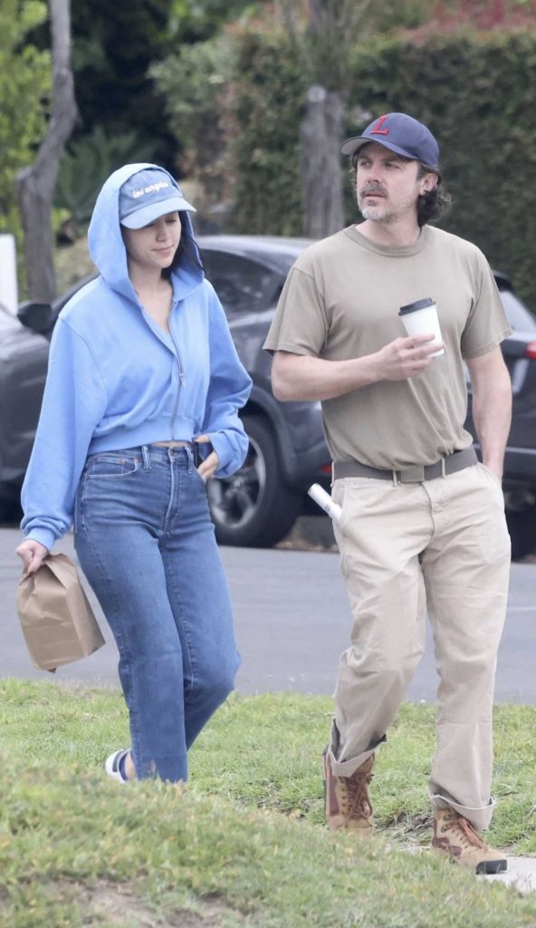 Caylee Cowan in a Blue Hoodie