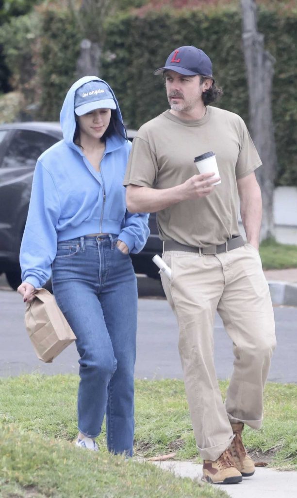 Caylee Cowan in a Blue Hoodie