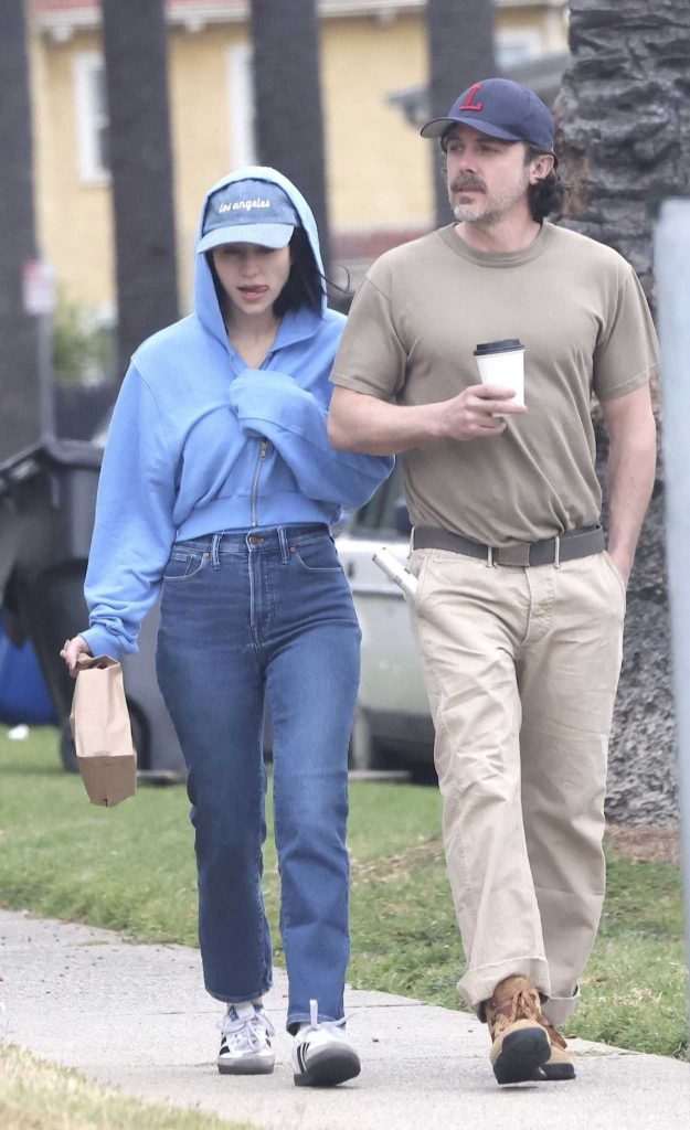 Caylee Cowan in a Blue Hoodie