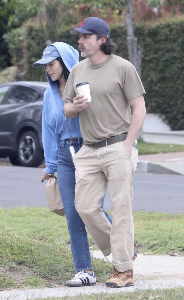 Caylee Cowan in a Blue Hoodie