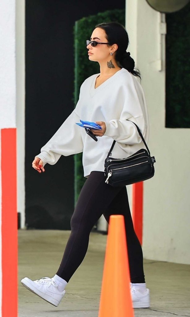 Demi Lovato in a White Nike Sneakers