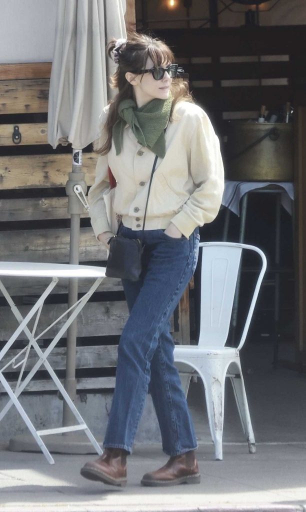 Elizabeth Olsen in a Beige Jacket