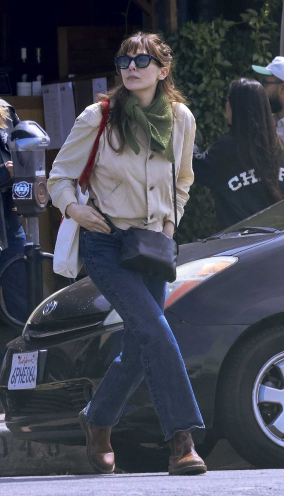 Elizabeth Olsen in a Beige Jacket