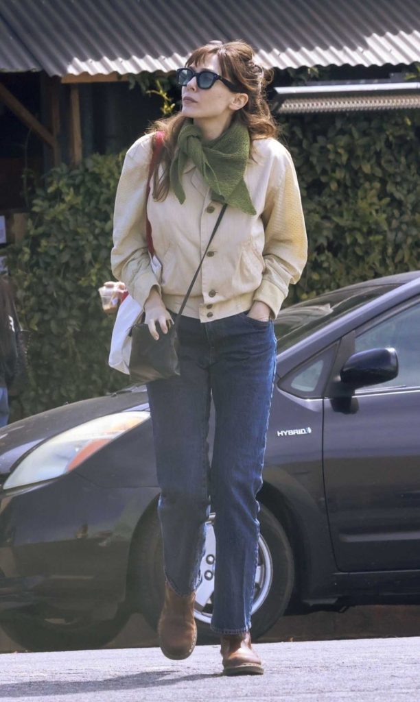 Elizabeth Olsen in a Beige Jacket