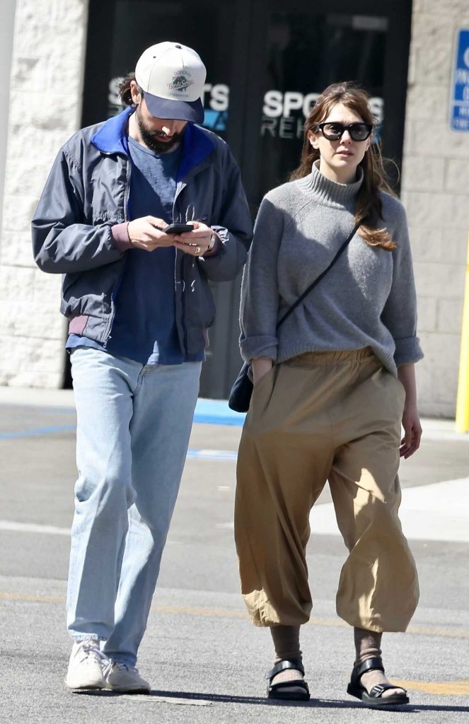 Elizabeth Olsen in a Grey Sweater