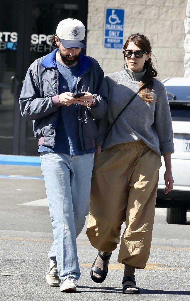 Elizabeth Olsen in a Grey Sweater