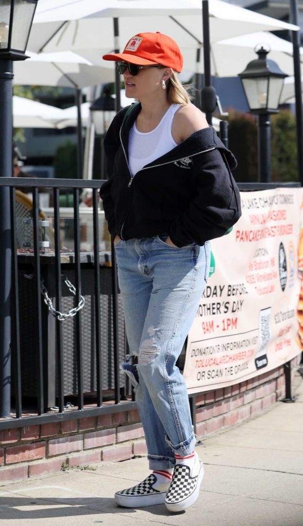 Emily Osment in an Orange Cap