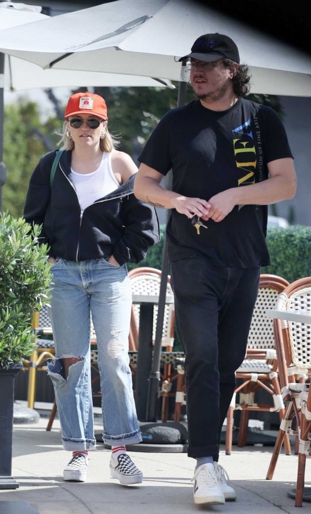 Emily Osment in an Orange Cap