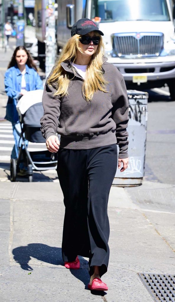 Jennifer Lawrence in a Black Cap