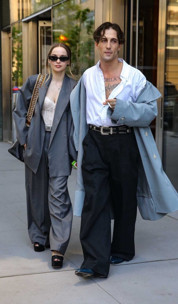 Dove Cameron in a Grey Pantsuit