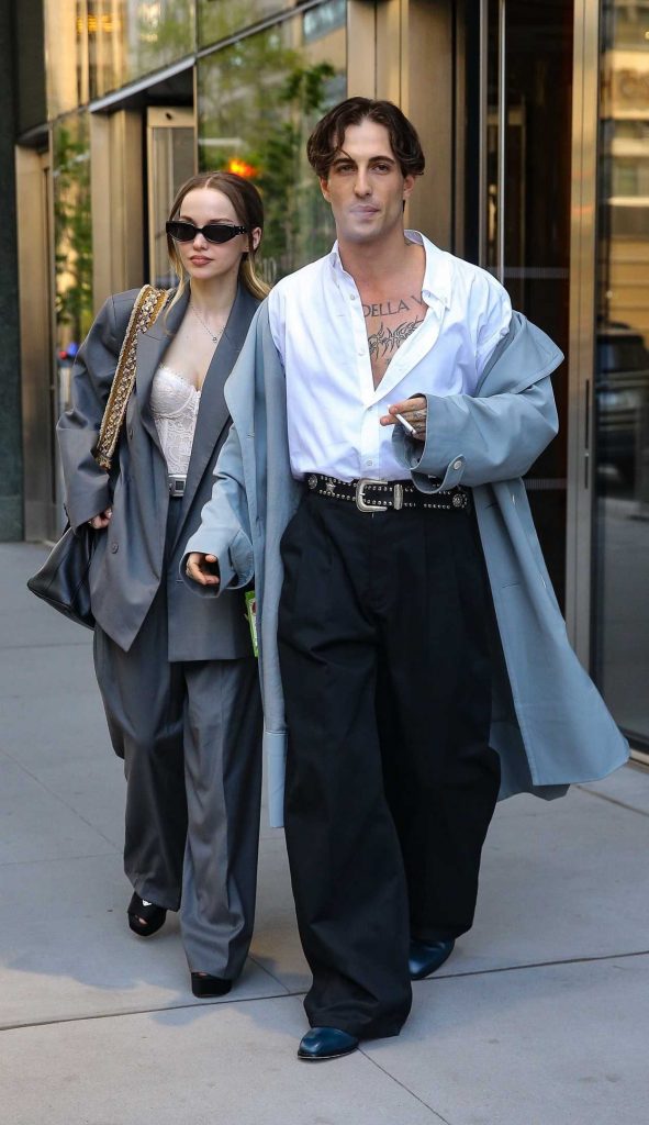 Dove Cameron in a Grey Pantsuit