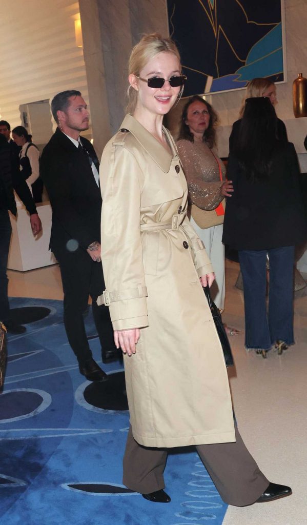Elle Fanning in a Beige Trench Coat