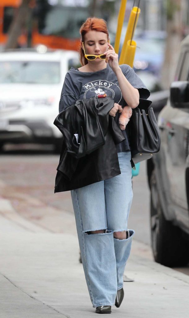 Emma Roberts in a Blue Ripped Jeans