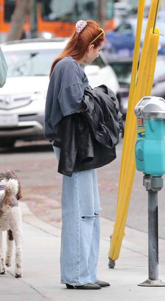 Emma Roberts in a Blue Ripped Jeans