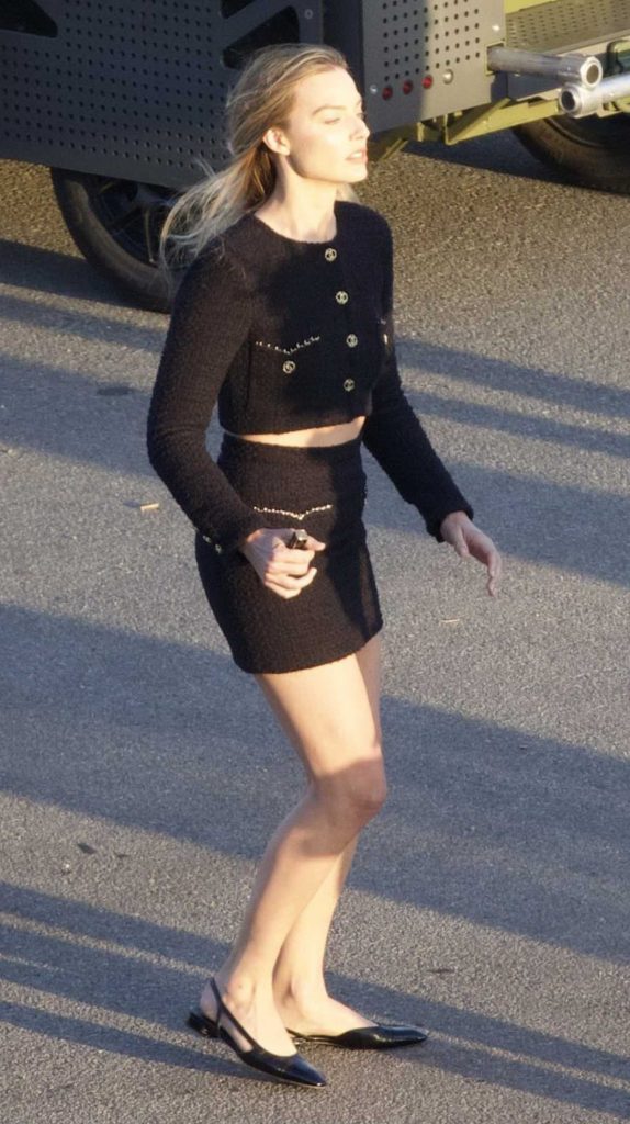 Margot Robbie in a Black Ensemble
