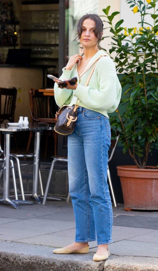 Alicia Vikander in a Blue Jeans