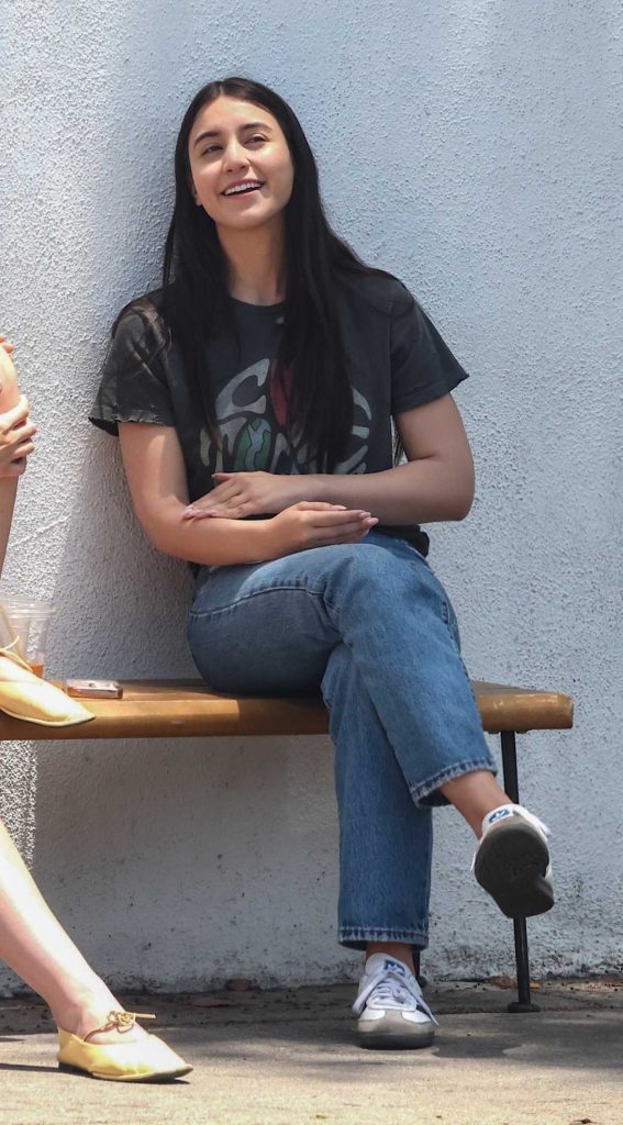 Caylee Cowan in a Black Tee