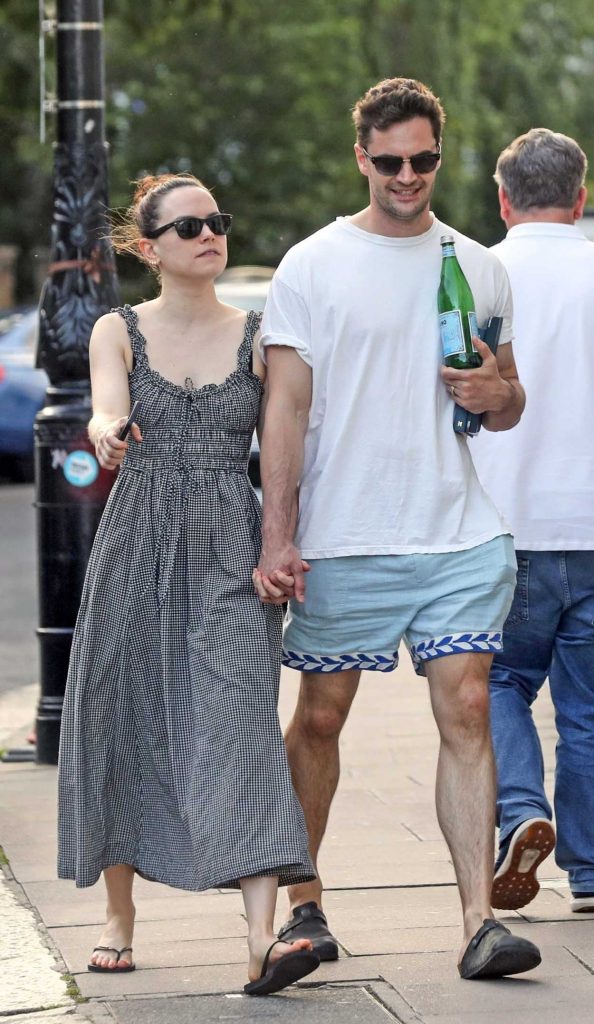 Daisy Ridley in a Grey Dress