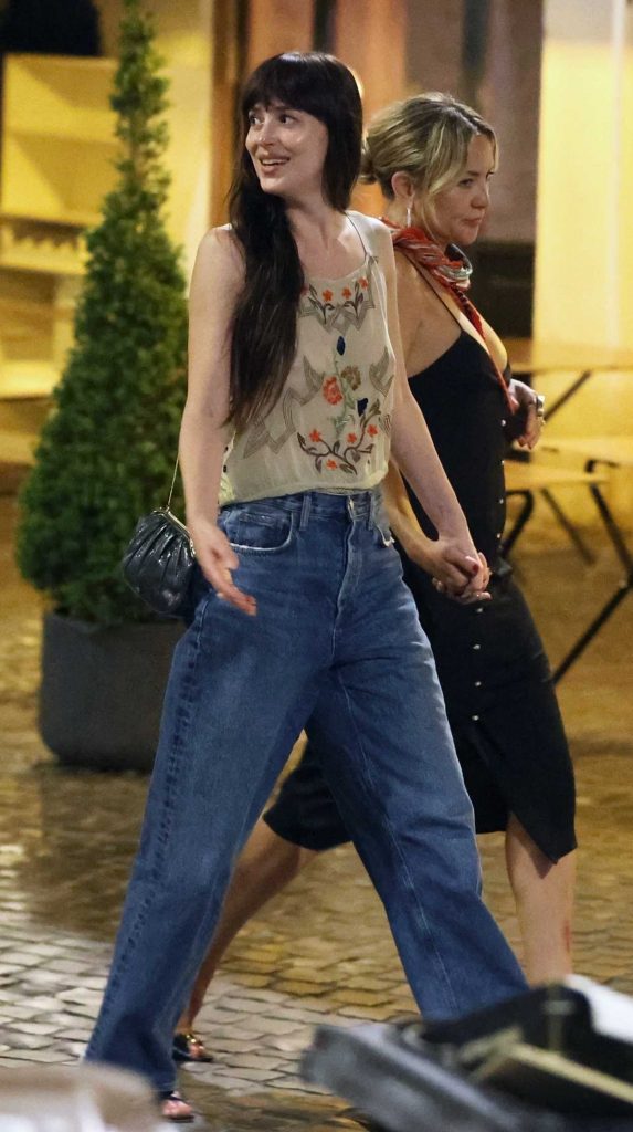 Dakota Johnson in a Beige Blouse