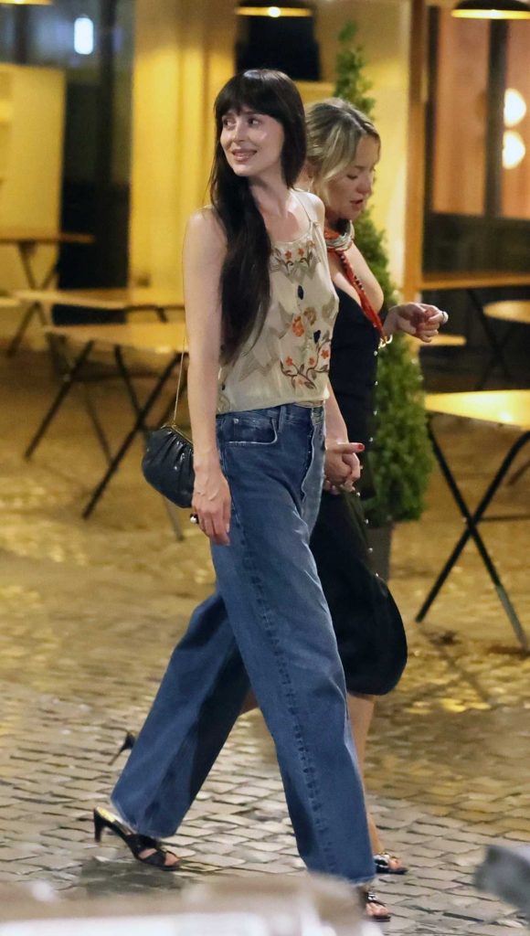 Dakota Johnson in a Beige Blouse