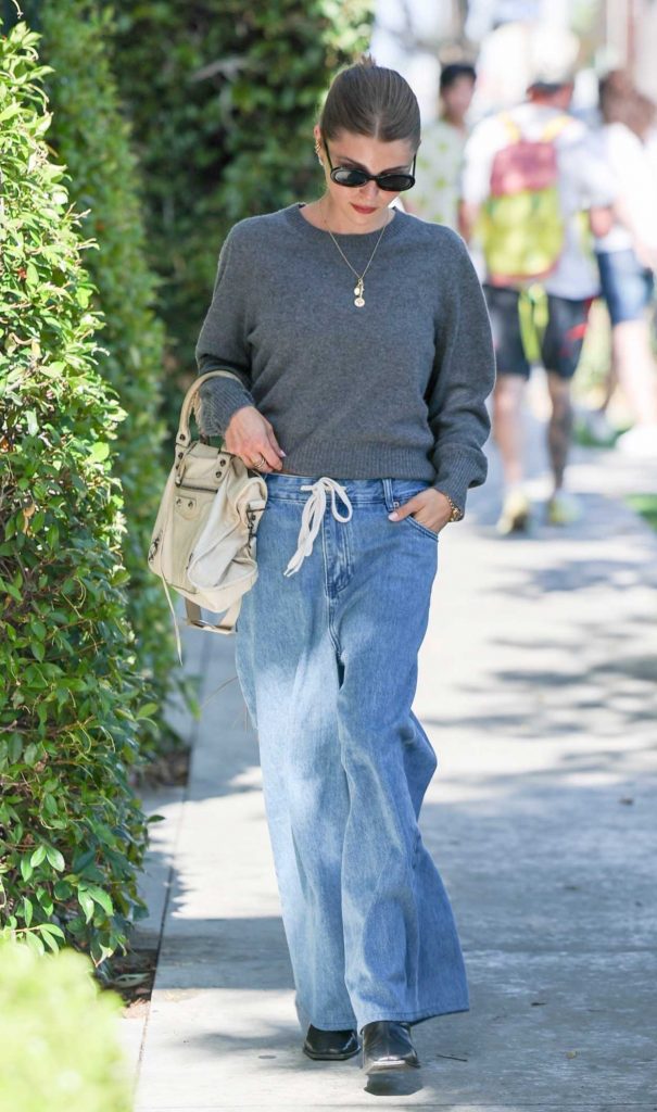 Olivia Jade in a Grey Sweater
