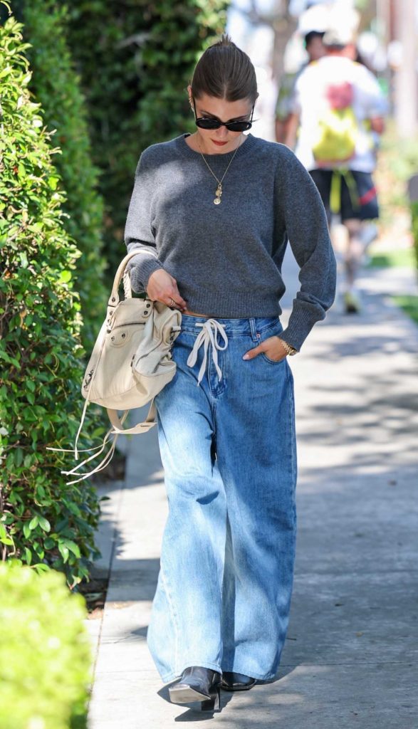 Olivia Jade in a Grey Sweater