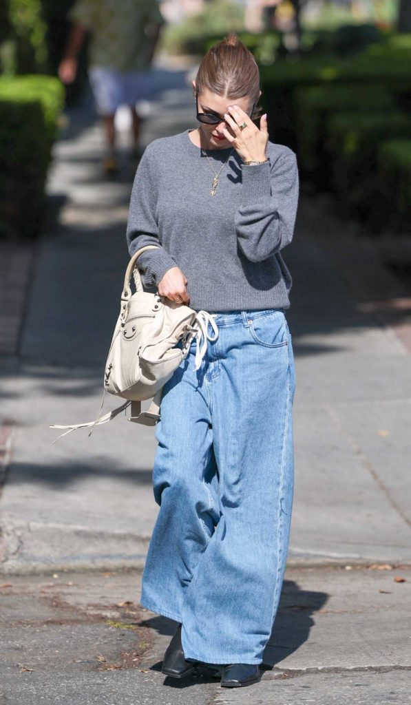 Olivia Jade in a Grey Sweater