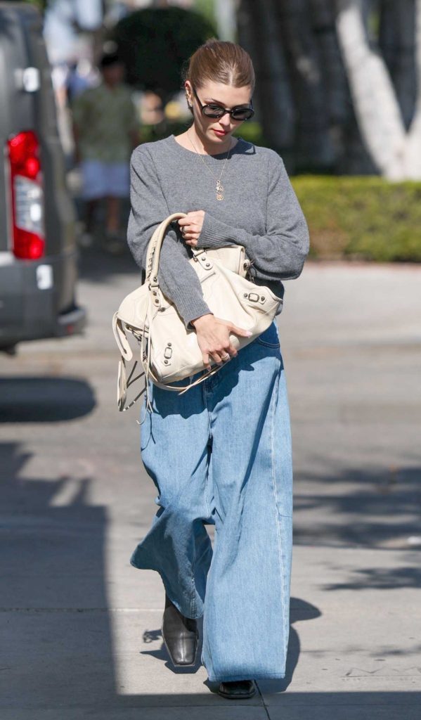 Olivia Jade in a Grey Sweater