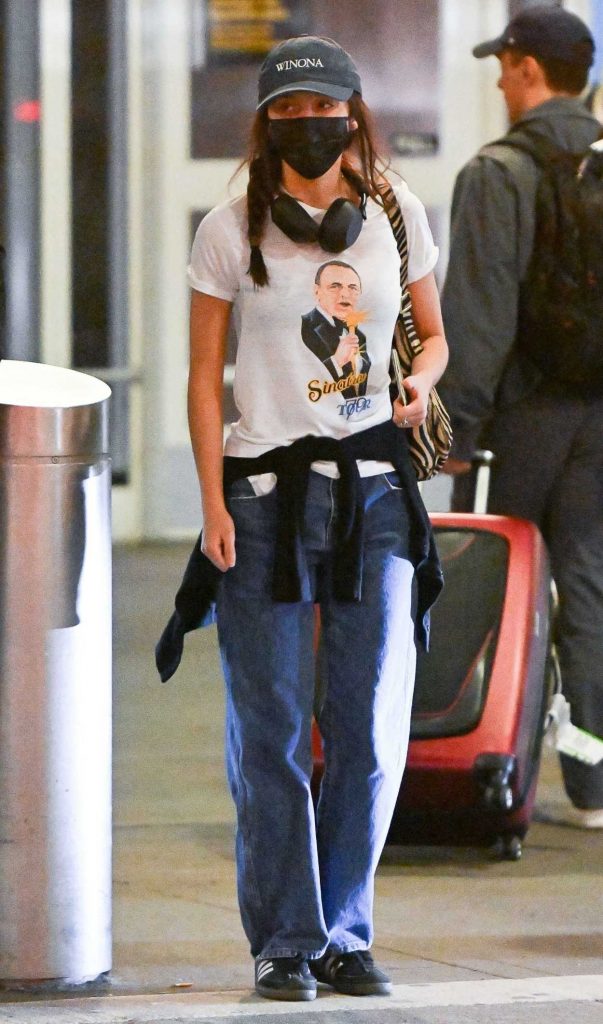 Olivia Rodrigo in a Black Protective Mask