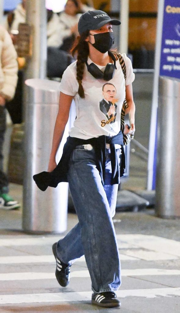 Olivia Rodrigo in a Black Protective Mask