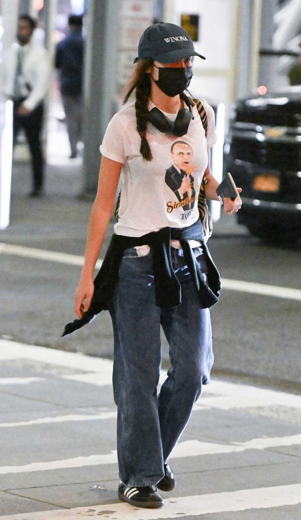 Olivia Rodrigo in a Black Protective Mask