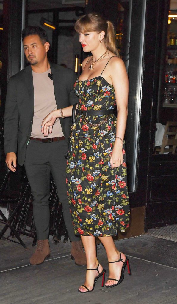 Taylor Swift in a Floral Black Dress