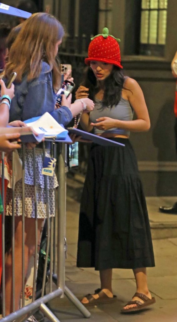 Rachel Zegler in a Grey Top