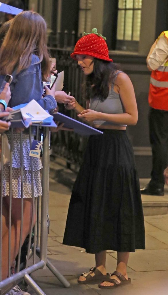 Rachel Zegler in a Grey Top