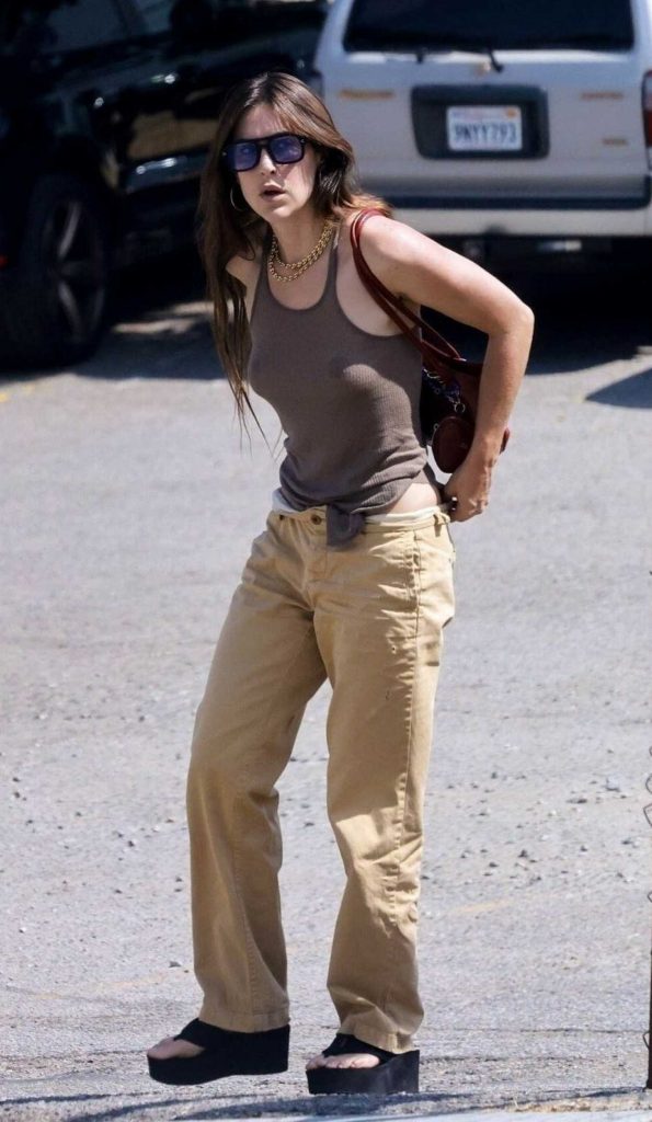 Scout Willis in a Brown Tank Top