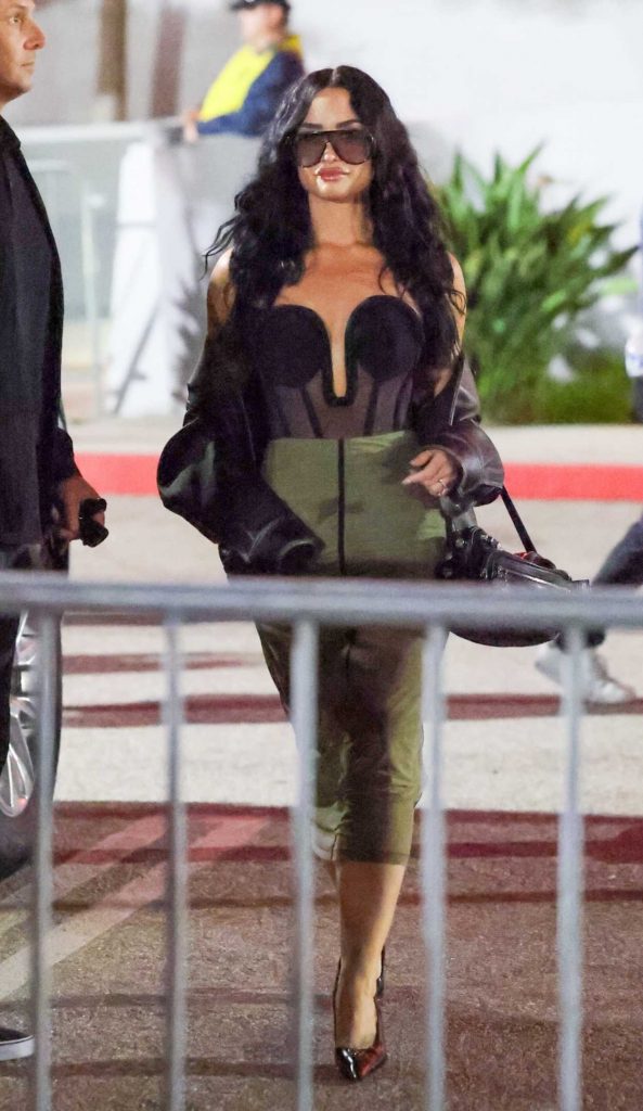 Demi Lovato in an Olive Skirt