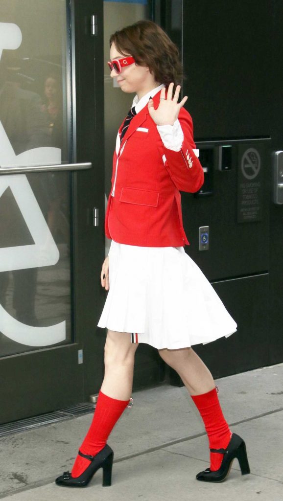 Emma Myers in a Red Blazer