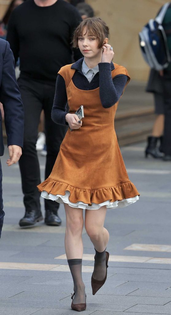 Emma Myers in a Tan Dress