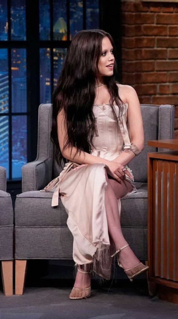 Jenna Ortega in a Beige Dress